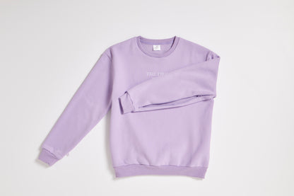 The Drip Crew Lavender flat lay showing arm zip