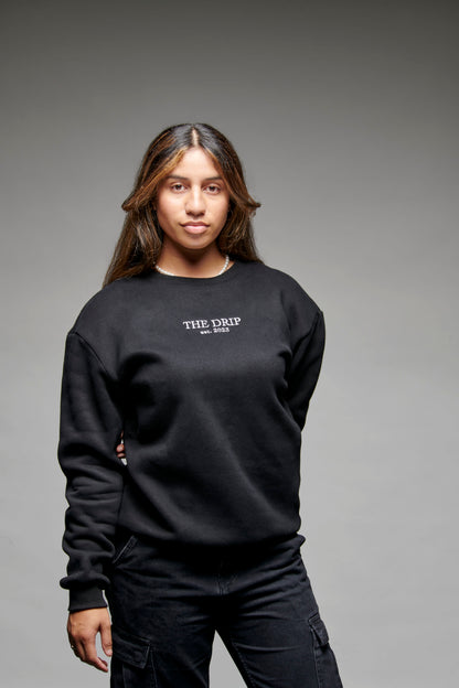 Woman wearing The Drip Crew in Black